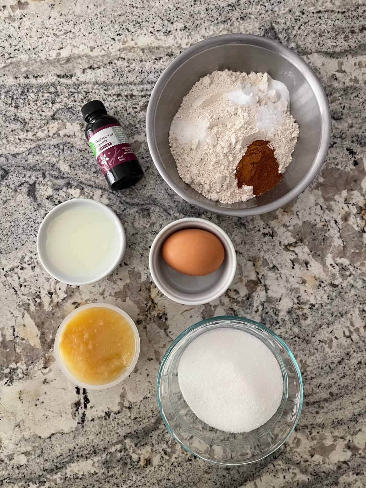 Ingredients including vanilla, unsweetened applesauce, low-fat buttermilk, Swerve sweetener, egg, whole wheat pastry flour, cinnamon, salt, and baking soda.