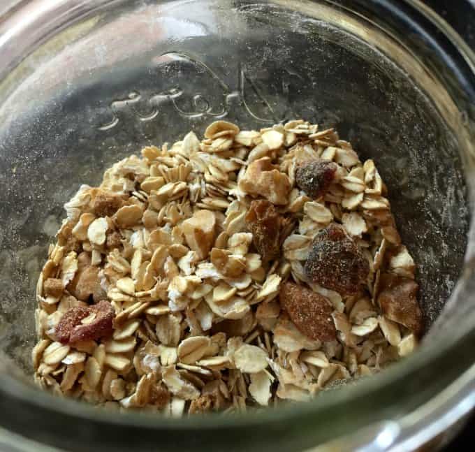 Homemade dry muesli in a glass mason jar from above