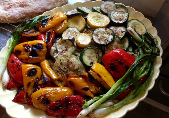 Yellow Oval Platter Grilled red peppers, zucchini, squash, scallions.