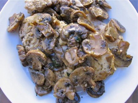 Healthy Chicken Marsala on white plate from above.