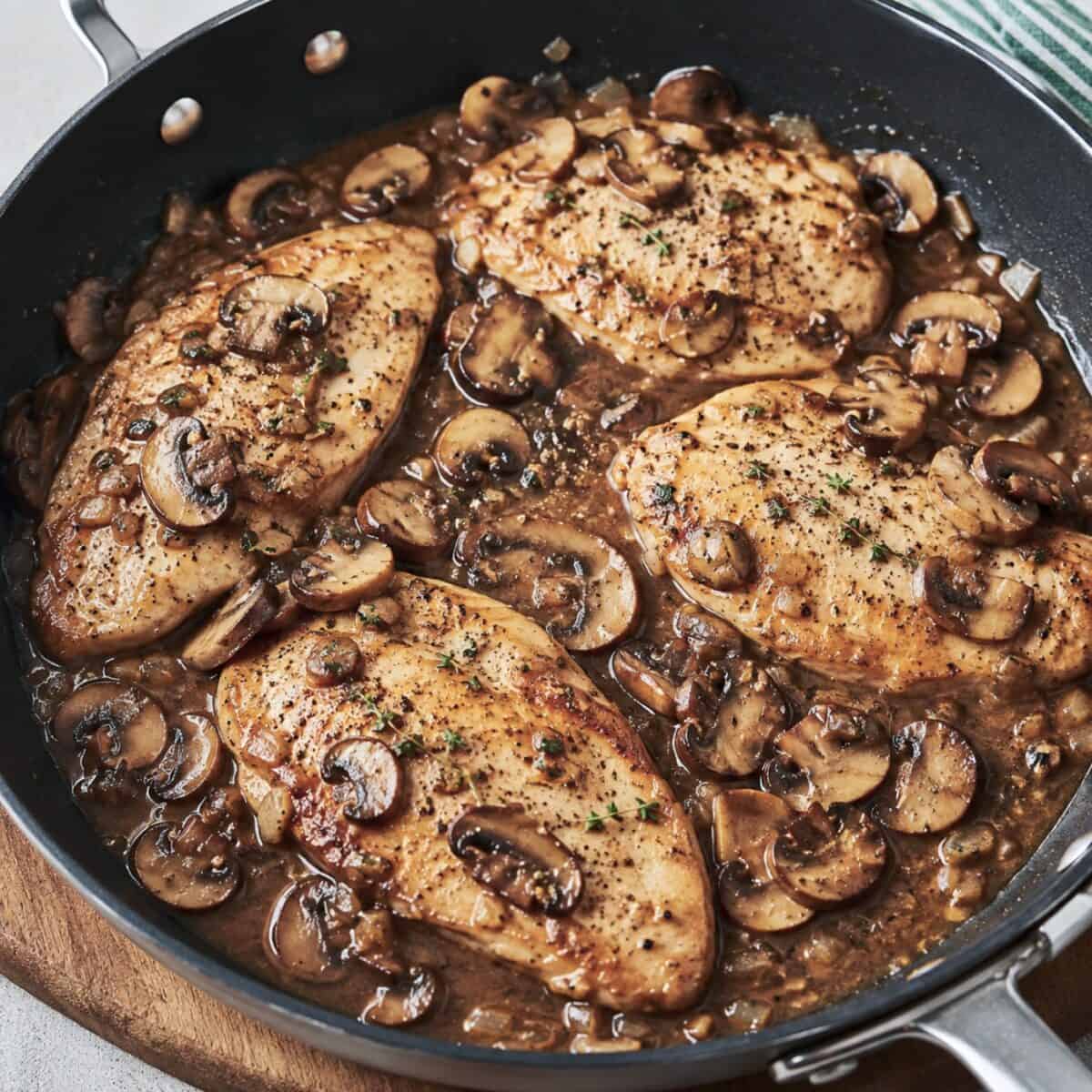 Cooking chicken marsala in nonstick skillet.