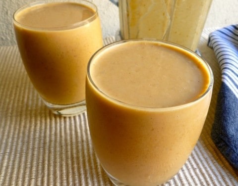 Two glasses filled with Pumpkin Pie Smoothie.