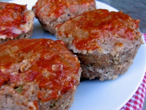 Mini Meat Loaf Muffins on a white plate with red checked napkin