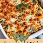 A white casserole of creamy spinach artichoke baked pasta with text box overlay for Pinterest PIN