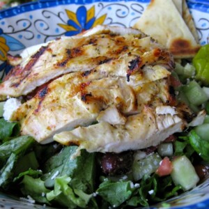 Grilled Chicken Greek Salad in colorful ceramic bowl