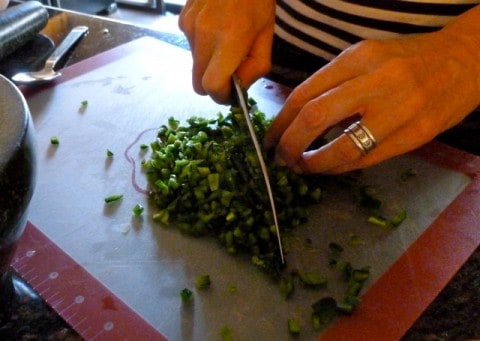 Chopping chiles for salsa.