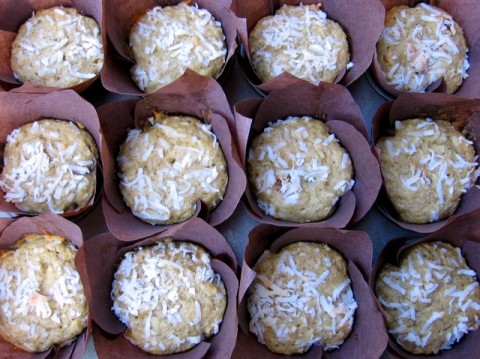 Banana Coconut Date Muffins wrapped in brown paper