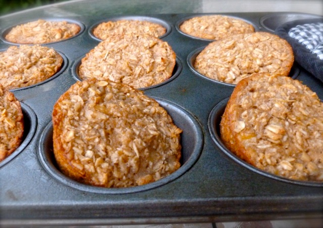 Healthy Baked Banana Bread Oatmeal Muffins in a muffin tin