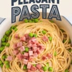 a big bowl of spaghetti with ham & peas with text overlay for Pinterest Pin