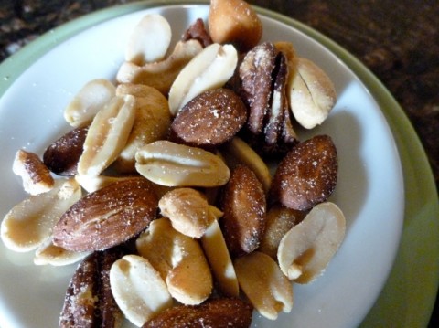 Assortment of nuts in a small white dish