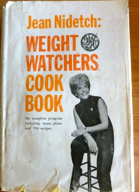 Cover of Original Weight Watchers Cookbook 1960s with Jean Nieditch sitting on a stool