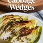 roasted cabbage wedges on a white serving platter with text overlay