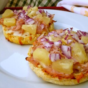 Close Up of Hawaiian English Muffin Pizza on White Plate
