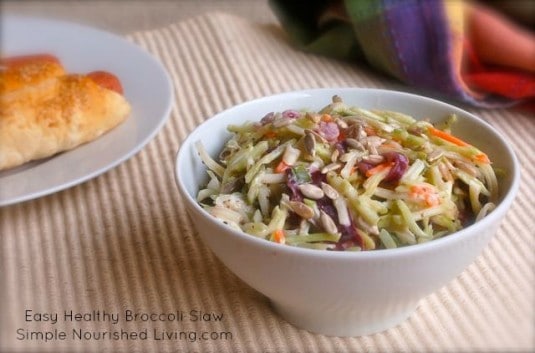Easy Healthy Broccoli Slaw white bowl on beige textured mat