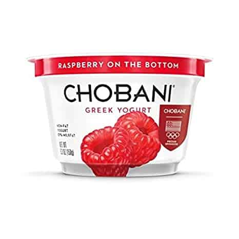 Small container of Chobani Greek Yogurt with raspberry on the bottom