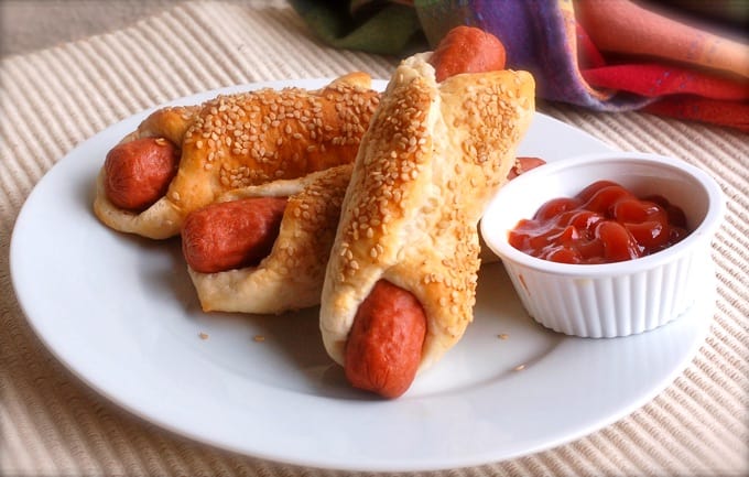 Pigs in a Blanket - aka Hot Dogs wrapped in biscuits with a side of ketchup