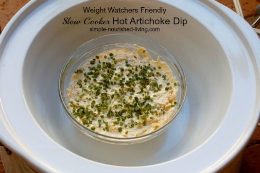 Slow Cooker Artichoke Dip in small glass bowl.