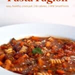 Low fat slow cooker pasta fagioli in white bowl up close.