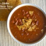 Slow Cooker Baked Bean Soup from above beige textured mat