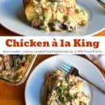 Creamy slow cooker chicken a la king over baked potato on white dinner plate with a fork.