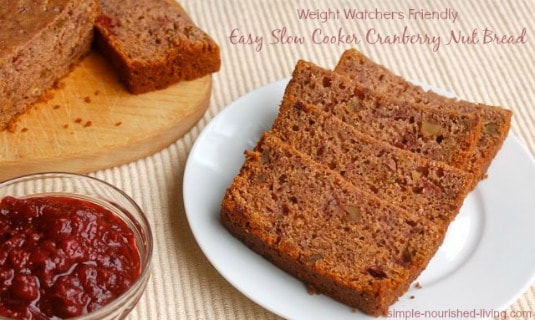 Easy Cranberry Nut Bread slices on white plate.