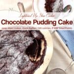 Slow Cooker Chocolate Pudding Cake dusted with powdered sugar with serving spoon and piece of chocolate cake on small dish
