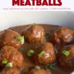 Slow cooker cranberry meatballs in creamy gravy up close.