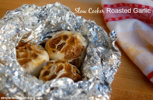 Slow Cooker Roasted Garlic wrapped in tin foil