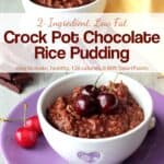 Two bowls of chocolate rice pudding topped with fresh cherries.