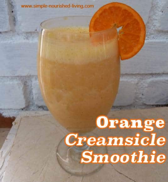 Orange Creamsicle Smoothie garnished with fresh orange slice in a glass.