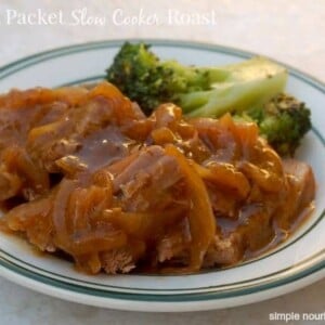 Mom's 3 Packet Slow Cooker Roast and broccoli white plate with green rim
