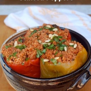 Slow Cooker Couscous Stuffed Peppers in a pottery bowl