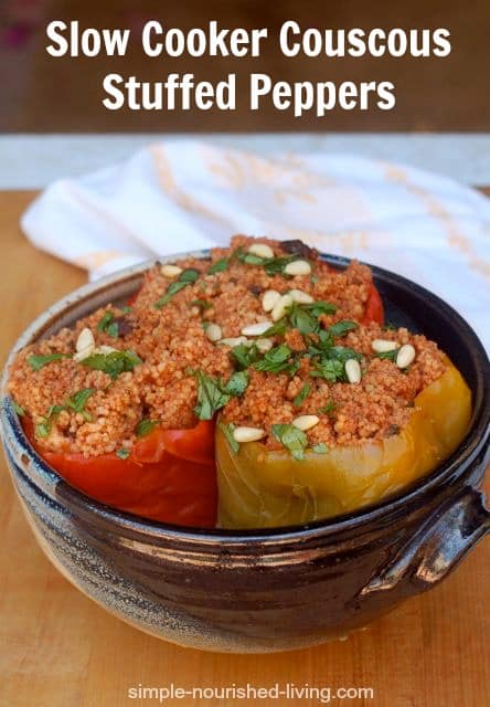 Slow Cooker Couscous Stuffed Peppers in ceramic serving dish.