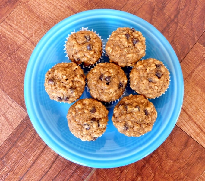 Banana Oatmeal Chocolate Chip Mini Muffins on a blue plate from above