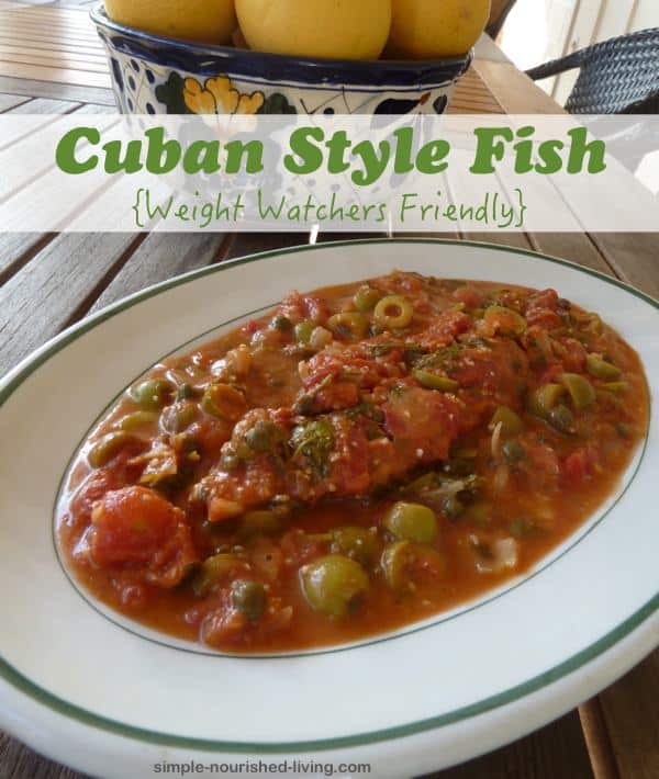Cuban-Style Fish in sauce with tomatoes, olives and capers on serving platter.