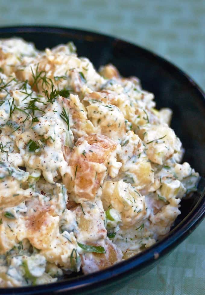 Potato Salad with Dill in blue bowl up close