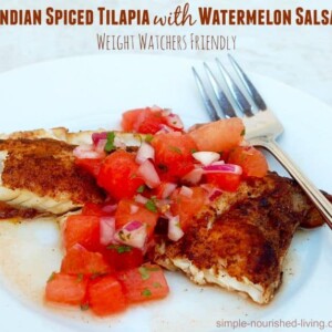 Indian Spiced Tilapia with Watermelon Salsa white plate fork alongside