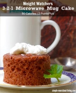 Weight Watchers 3-2-1 Microwave Mug Cake topped with whipped cream.