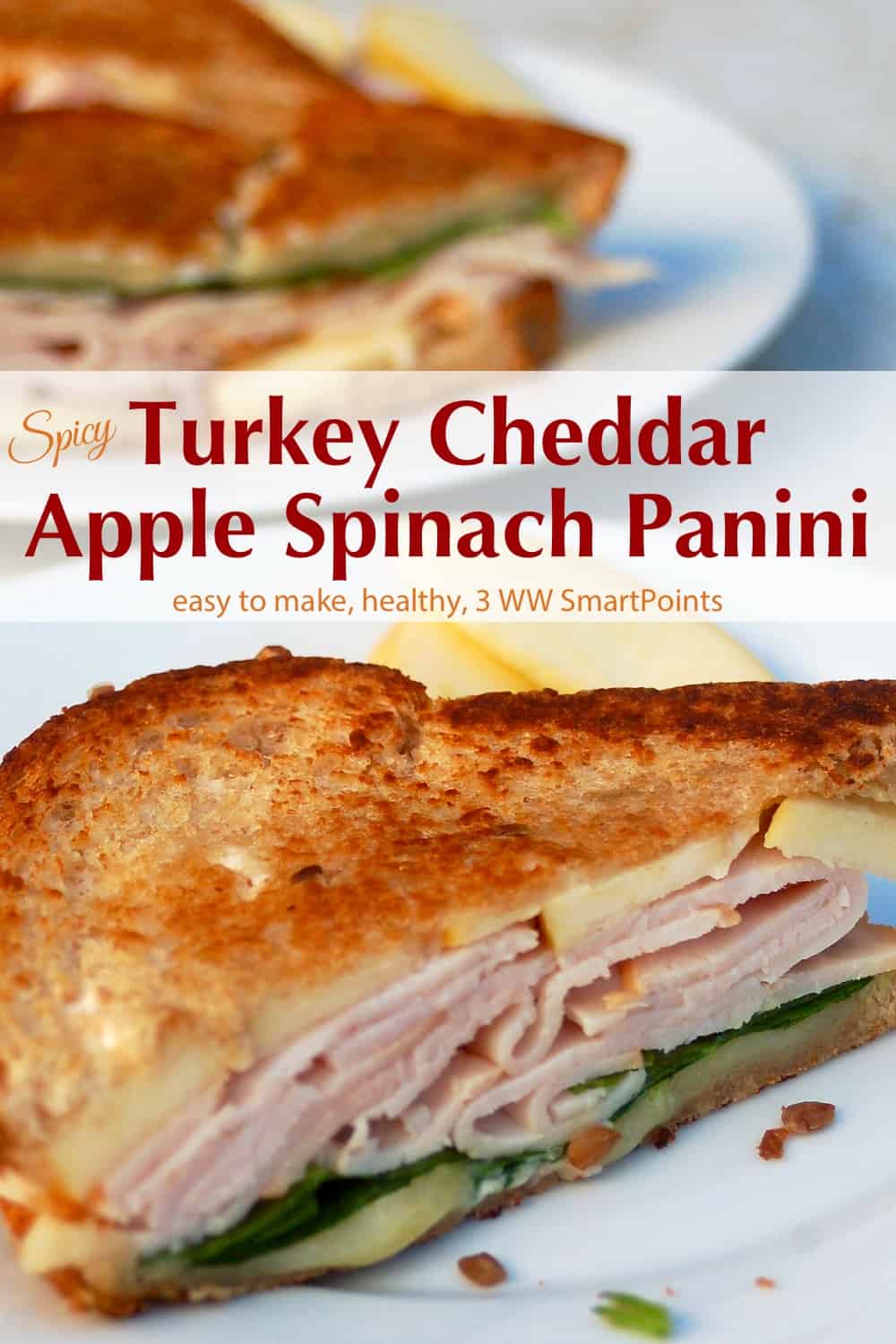 Turkey panini with cheddar, apple and spinach on plate with another panini sandwich in background