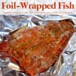 Salmon fillet with seasonings in tin foil.