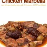 Slow cooker chicken marbella with olives, prunes and capers on white dinner plate.