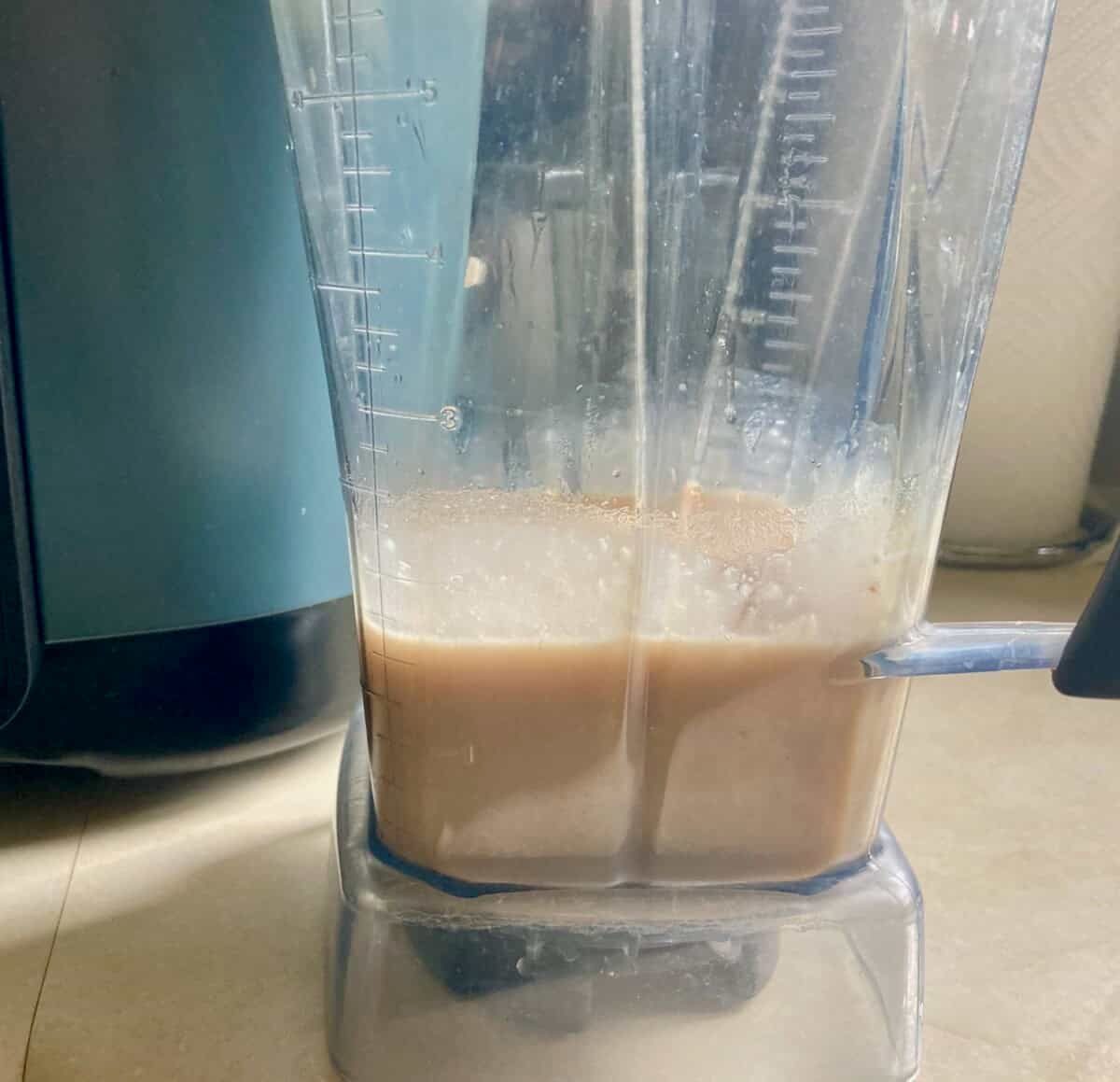 Pureed Beans in Blender with Slow Cooker Behind