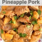 close up of crockpot pineapple pork on china plate shot from above with Text Overlay for Pinterest PIN