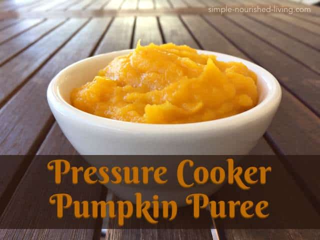 Homemade Pressure Cooker Pumpkin Puree in small white dish on wood table.