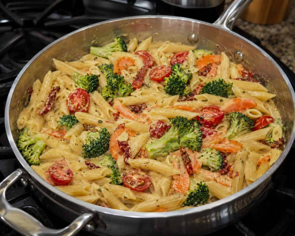 Creamy One Pot Pasta in large sauce pan on stove top.