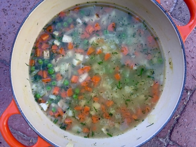 Soup pot with Chicken Orzo Soup.