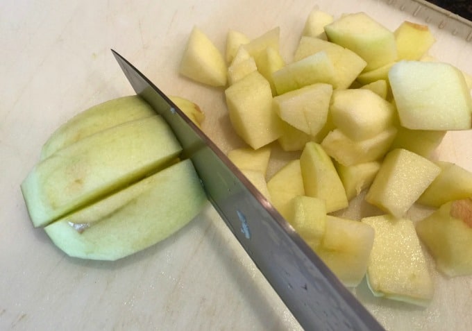 Chopped apple knife cutting board