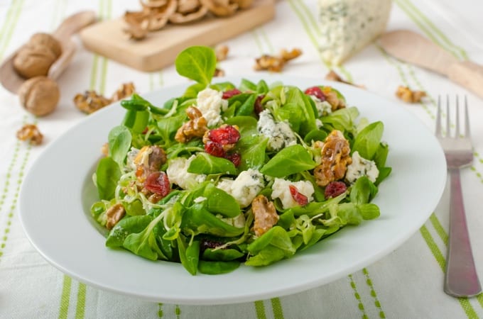 Salad with blue cheese and balsamic dressing, with nuts and cranberries