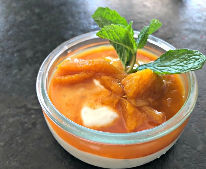 Skinny cardamom yogurt pudding topped with oranges and mint
