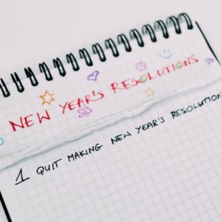 notebook with new years resolution title